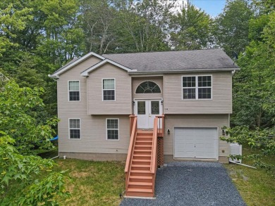 Welcome to a beautifully renovated bi-level home located in a on Pocono Farms Country Club in Pennsylvania - for sale on GolfHomes.com, golf home, golf lot