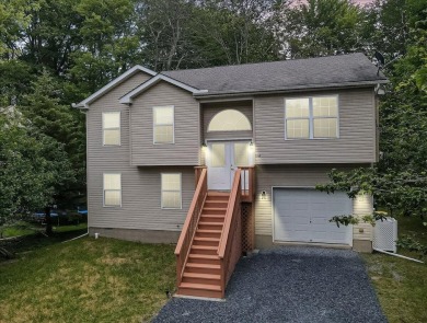 Welcome to a beautifully renovated bi-level home located in a on Pocono Farms Country Club in Pennsylvania - for sale on GolfHomes.com, golf home, golf lot