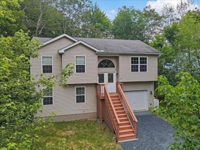 Welcome to a beautifully renovated bi-level home located in a on Pocono Farms Country Club in Pennsylvania - for sale on GolfHomes.com, golf home, golf lot
