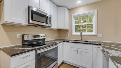 Welcome to a beautifully renovated bi-level home located in a on Pocono Farms Country Club in Pennsylvania - for sale on GolfHomes.com, golf home, golf lot