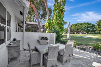 This retreat in the village of Cedar Cay blends its on Broken Sound Golf and Club  in Florida - for sale on GolfHomes.com, golf home, golf lot