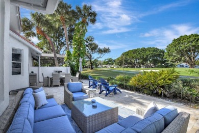 This retreat in the village of Cedar Cay blends its on Broken Sound Golf and Club  in Florida - for sale on GolfHomes.com, golf home, golf lot