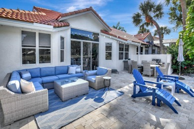 This retreat in the village of Cedar Cay blends its on Broken Sound Golf and Club  in Florida - for sale on GolfHomes.com, golf home, golf lot