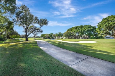 This retreat in the village of Cedar Cay blends its on Broken Sound Golf and Club  in Florida - for sale on GolfHomes.com, golf home, golf lot