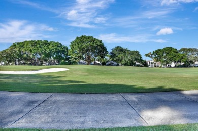 This retreat in the village of Cedar Cay blends its on Broken Sound Golf and Club  in Florida - for sale on GolfHomes.com, golf home, golf lot