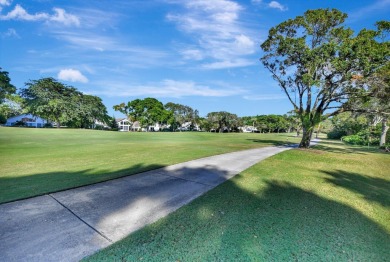 This retreat in the village of Cedar Cay blends its on Broken Sound Golf and Club  in Florida - for sale on GolfHomes.com, golf home, golf lot