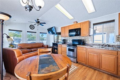 Welcome home to this beautifully maintained park model in the on Riverview Golf Course in Arizona - for sale on GolfHomes.com, golf home, golf lot