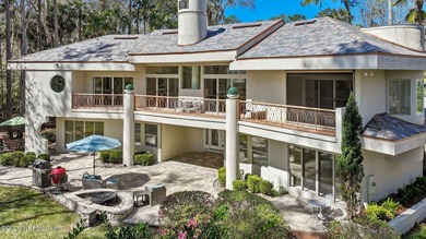 These views, this crisp modern design, the location on #9, glass on TPC at Sawgrass in Florida - for sale on GolfHomes.com, golf home, golf lot