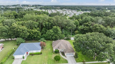 SILVER OAKS IS THE PLACE TO BE!  Winding, Private streets around on Silverado Golf and Country Club in Florida - for sale on GolfHomes.com, golf home, golf lot