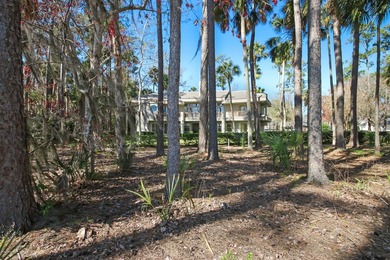 These views, this crisp modern design, the location on #9, glass on TPC at Sawgrass in Florida - for sale on GolfHomes.com, golf home, golf lot