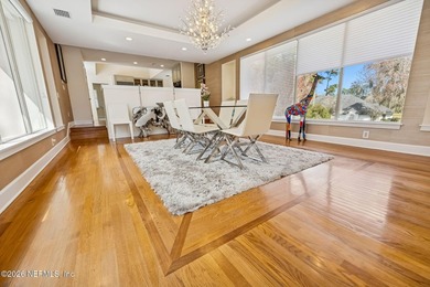 These views, this crisp modern design, the location on #9, glass on TPC at Sawgrass in Florida - for sale on GolfHomes.com, golf home, golf lot