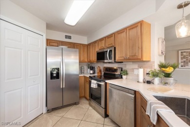 Enjoy serene water views in this bright, first-floor condo in on Bonita Fairways in Florida - for sale on GolfHomes.com, golf home, golf lot