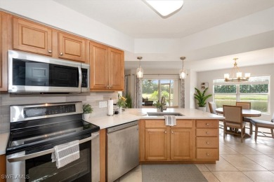 Enjoy serene water views in this bright, first-floor condo in on Bonita Fairways in Florida - for sale on GolfHomes.com, golf home, golf lot