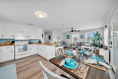 Beautiful, classic beach cottage on Mobile Bay with an on Kiva Dunes Golf Club in Alabama - for sale on GolfHomes.com, golf home, golf lot