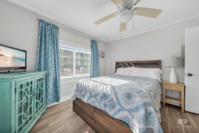 Beautiful, classic beach cottage on Mobile Bay with an on Kiva Dunes Golf Club in Alabama - for sale on GolfHomes.com, golf home, golf lot