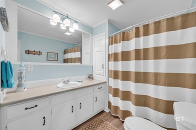 Beautiful, classic beach cottage on Mobile Bay with an on Kiva Dunes Golf Club in Alabama - for sale on GolfHomes.com, golf home, golf lot