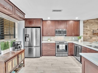 Beautiful 2 bdr/ 2 ba 2nd floor unit in desirable Aspen Glen on Indian Spring Golf and Country Club in Florida - for sale on GolfHomes.com, golf home, golf lot