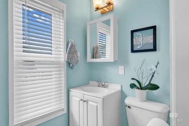 Beautiful, classic beach cottage on Mobile Bay with an on Kiva Dunes Golf Club in Alabama - for sale on GolfHomes.com, golf home, golf lot