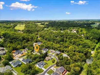 Located in the Center of Tellico Village between 2 Golf Courses on Toqua Golf Course - Loudon County in Tennessee - for sale on GolfHomes.com, golf home, golf lot
