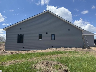 Come take a look at this brand new build with top level finishes on Mistwood Golf Course in Michigan - for sale on GolfHomes.com, golf home, golf lot