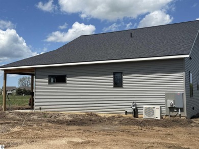 Come take a look at this brand new build with top level finishes on Mistwood Golf Course in Michigan - for sale on GolfHomes.com, golf home, golf lot