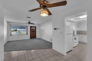 Pompano Beach Private Golf Community. 2 BR/BA with carport on Leisureville Community Association in Florida - for sale on GolfHomes.com, golf home, golf lot