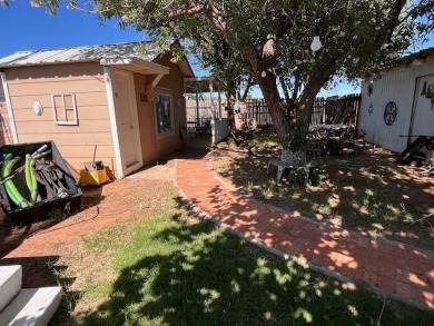 An entire half block is included with this home, perfect for on Rotan Golf Club in Texas - for sale on GolfHomes.com, golf home, golf lot