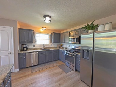 Welcome to this stunning 5-level split in the highly desirable on Scioto Reserve Golf and Athletic Club in Ohio - for sale on GolfHomes.com, golf home, golf lot