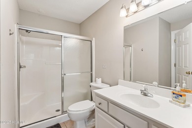 Welcome to your coastal retreat! This spacious 2-bedroom on Brunswick Plantation and Golf Resorts in North Carolina - for sale on GolfHomes.com, golf home, golf lot