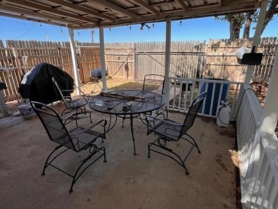 An entire half block is included with this home, perfect for on Rotan Golf Club in Texas - for sale on GolfHomes.com, golf home, golf lot