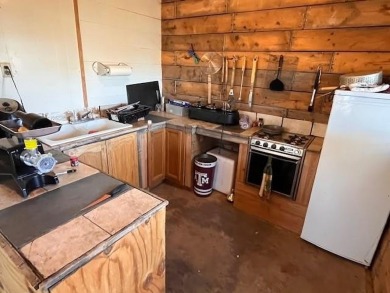 An entire half block is included with this home, perfect for on Rotan Golf Club in Texas - for sale on GolfHomes.com, golf home, golf lot