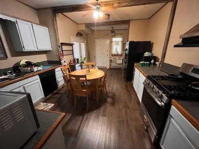 An entire half block is included with this home, perfect for on Rotan Golf Club in Texas - for sale on GolfHomes.com, golf home, golf lot