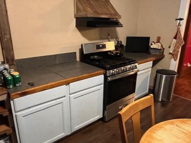An entire half block is included with this home, perfect for on Rotan Golf Club in Texas - for sale on GolfHomes.com, golf home, golf lot