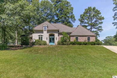 This is a beautiful 3 bedroom/ 2 bath home located right on the on Lake D Arbonne Country Club in Louisiana - for sale on GolfHomes.com, golf home, golf lot