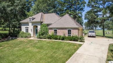 This is a beautiful 3 bedroom/ 2 bath home located right on the on Lake D Arbonne Country Club in Louisiana - for sale on GolfHomes.com, golf home, golf lot