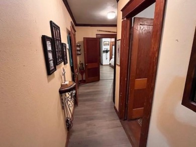 An entire half block is included with this home, perfect for on Rotan Golf Club in Texas - for sale on GolfHomes.com, golf home, golf lot