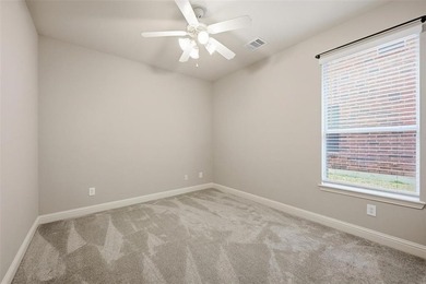 This beautiful home offers 4 beds, 2 baths, 2 car garage on Heritage Lakes - Par 3 - 9 Hole Course in Texas - for sale on GolfHomes.com, golf home, golf lot