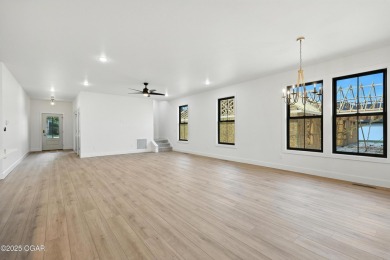Welcome to 4402 Par Ln, a beautifully designed new construction on Twin Hills Golf and Country Club in Missouri - for sale on GolfHomes.com, golf home, golf lot