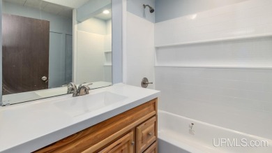 This spacious and charming 4 bedroom, 1.5 bath home is move-in on Pine Grove Country Club in Michigan - for sale on GolfHomes.com, golf home, golf lot