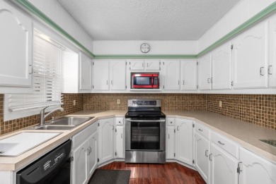 This lovely condo takes the hassle out of home ownership...no on Rolling Hills Country Club in Kansas - for sale on GolfHomes.com, golf home, golf lot