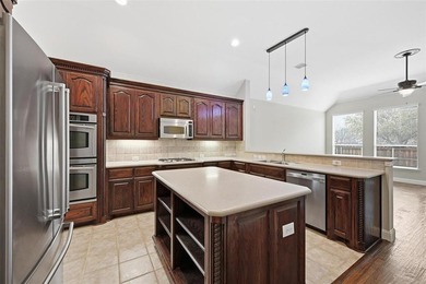 This beautiful home offers 4 beds, 2 baths, 2 car garage on Heritage Lakes - Par 3 - 9 Hole Course in Texas - for sale on GolfHomes.com, golf home, golf lot