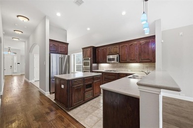 This beautiful home offers 4 beds, 2 baths, 2 car garage on Heritage Lakes - Par 3 - 9 Hole Course in Texas - for sale on GolfHomes.com, golf home, golf lot