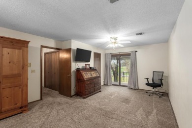 This lovely condo takes the hassle out of home ownership...no on Rolling Hills Country Club in Kansas - for sale on GolfHomes.com, golf home, golf lot