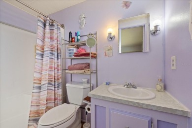 Charming 2-Bed, 2-Bath Home in 55+ Stonehenge Mobile Home Park - on Tarpon Springs Golf Course in Florida - for sale on GolfHomes.com, golf home, golf lot