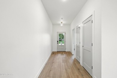 Welcome to 4402 Par Ln, a beautifully designed new construction on Twin Hills Golf and Country Club in Missouri - for sale on GolfHomes.com, golf home, golf lot