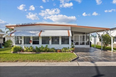 Charming 2-Bed, 2-Bath Home in 55+ Stonehenge Mobile Home Park - on Tarpon Springs Golf Course in Florida - for sale on GolfHomes.com, golf home, golf lot