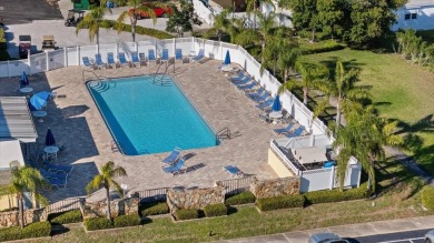 Charming 2-Bed, 2-Bath Home in 55+ Stonehenge Mobile Home Park - on Tarpon Springs Golf Course in Florida - for sale on GolfHomes.com, golf home, golf lot
