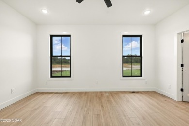 Welcome to 4402 Par Ln, a beautifully designed new construction on Twin Hills Golf and Country Club in Missouri - for sale on GolfHomes.com, golf home, golf lot