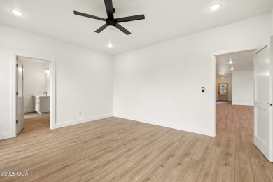 Welcome to 4402 Par Ln, a beautifully designed new construction on Twin Hills Golf and Country Club in Missouri - for sale on GolfHomes.com, golf home, golf lot