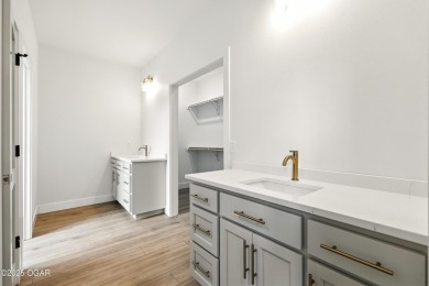Welcome to 4402 Par Ln, a beautifully designed new construction on Twin Hills Golf and Country Club in Missouri - for sale on GolfHomes.com, golf home, golf lot